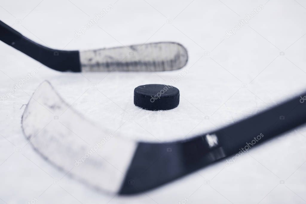 Close up background of two hockey clubs ready to start match on skating rink, copy space