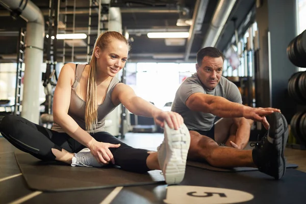 Full Length Portrait Smiling Sportive Couple Doing Stretching Exercises While — Stock Photo, Image