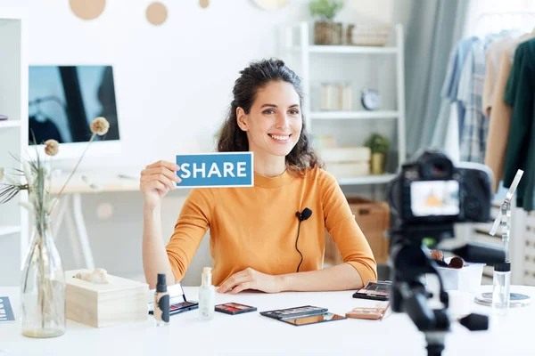 Attractive Young Adult Beauty Blogger Sitting Table Holding Share Print — Stock Photo, Image