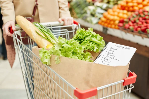 Close Unrecognizable Young Woman Pushing Shopping Cart While Buying Groceries — Stock Photo, Image