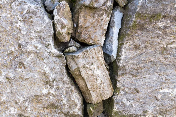 Gamla stenmuren som bakgrund med struktur — Stockfoto