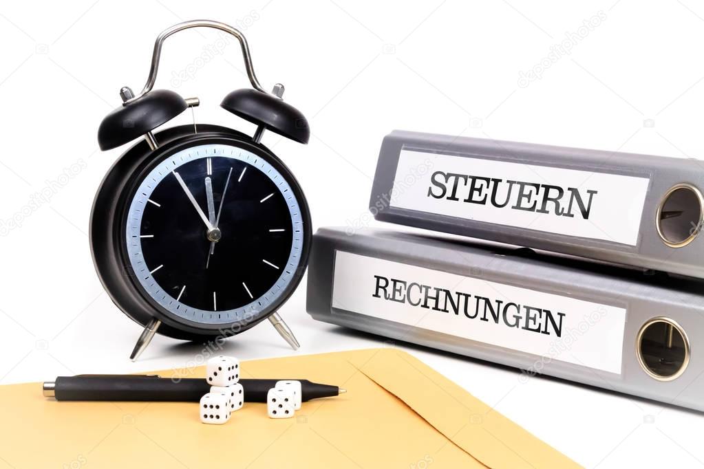 File folders and alarm clock symbolize time pressure. 