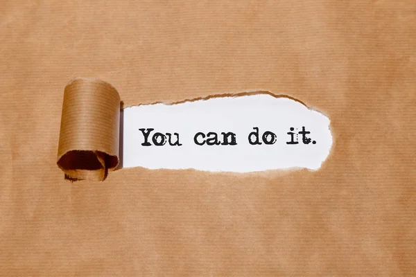 "You can do it" behind torn paper — Stock Photo, Image