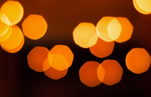 Photophon mit verschwommenem orangefarbenem Licht, leerer Raum für Text — Stockfoto