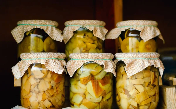 Home made mushrooms in glass jars, concept of home cooking natural organic products,  copy space Stock Picture