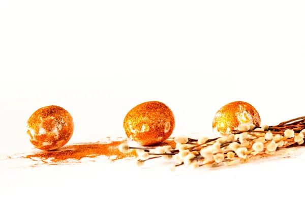 Easter eggs decorated with golden spangles on white background. Festive concept, minimalism. Close-up — Stok fotoğraf