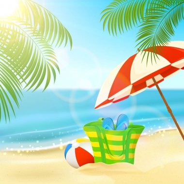 Çanta ve yaz tropikal plaj şemsiyesi