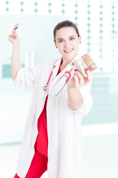 Beautiful female medic enjoying great payment — Stock Photo, Image