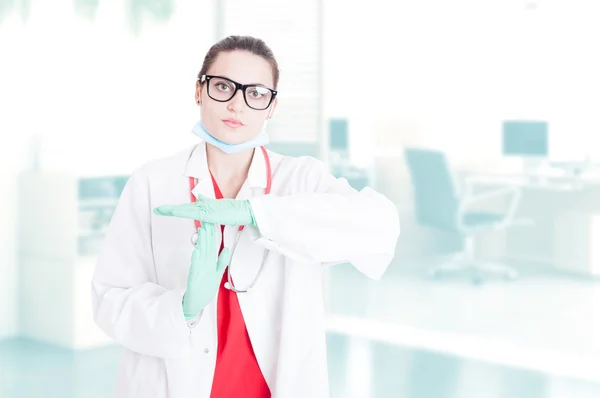 Attractive female doctor doing time out gesture — Stock Photo, Image