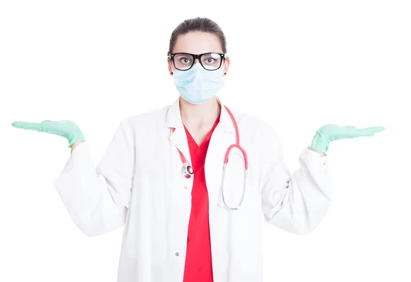 Young female surgeon with palms up — Stock Photo, Image