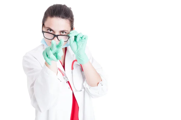 Medic doing I'm watching you gesture — Stock Photo, Image