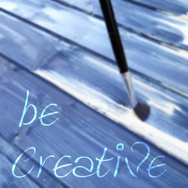 Quote be creative on blurred background