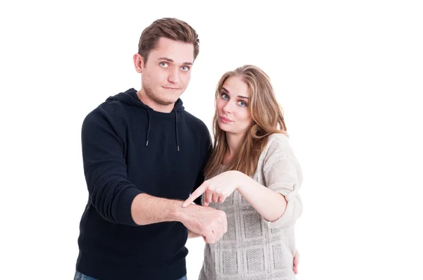 Couple posing and showing wrist watch — Stock Photo, Image