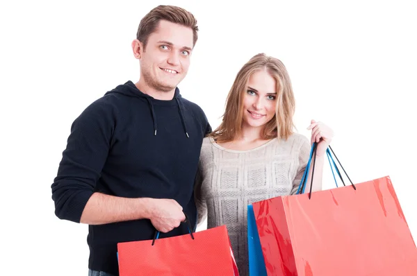 Çekici çift holding grup alışveriş torbaları — Stok fotoğraf