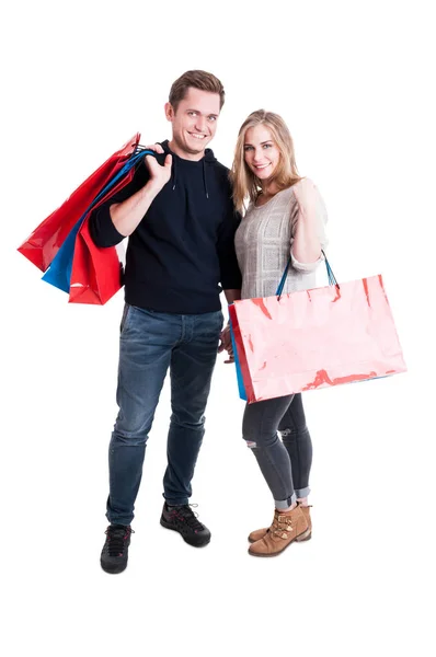 Tam vücut çift holding grup alışveriş torbaları — Stok fotoğraf