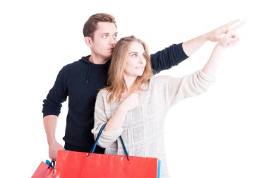 Kaç alışveriş torbaları demet basılı tutup yukarı dönük