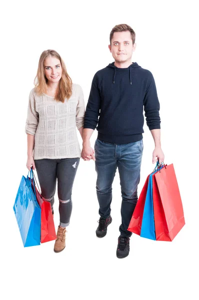Ganzkörper-Paar mit Bündel Einkaufstüten — Stockfoto