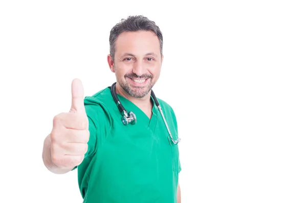 Attractive smiling medic giving thumb up — Stock Photo, Image