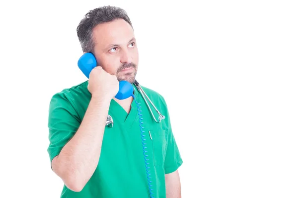 Serious male doctor having an important conversation — Stock Photo, Image