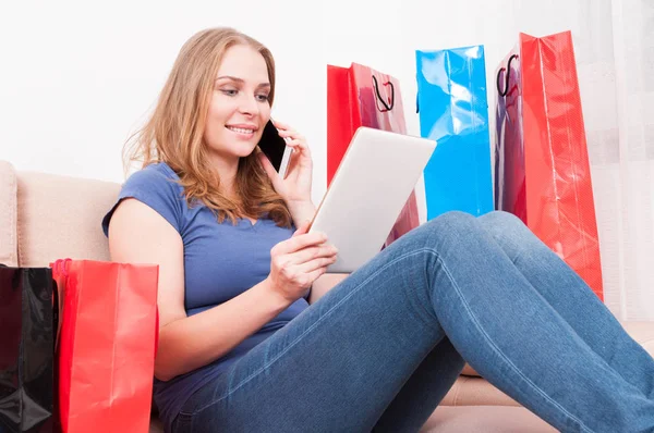 Lady talking at phone and shopping online holding tablet — Stock Photo, Image