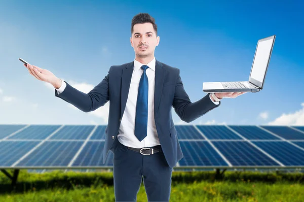 Young caucasian businessman with modern devices — Stock Photo, Image