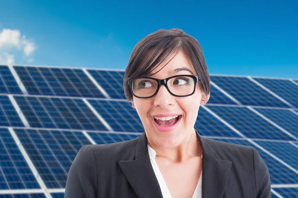 Excited female portrait at solar power station — Stock Photo, Image