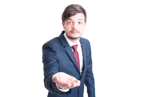 Vendite uomo facendo mendicare gesto con una mano — Foto Stock