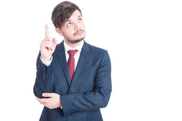 Sales man looking and showing up or idea — Stock Photo, Image