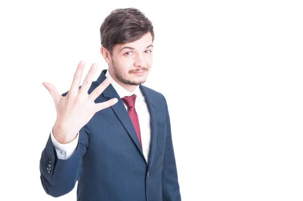 Marketing man showing number five with one hand — Stock Photo, Image