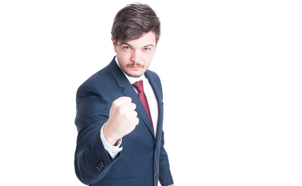 Sales man wearing suit showing fist like fighting — Stock Photo, Image