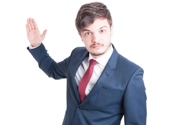 Business man standing looking violent with hand up — Stock Photo, Image