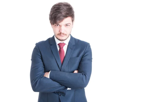 Young man wearing suit posing with arms crossed — Stock Photo, Image