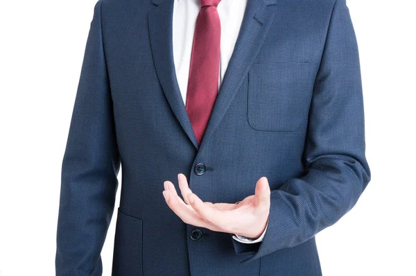 Close-up of business man standing and holding something — Stock Photo, Image