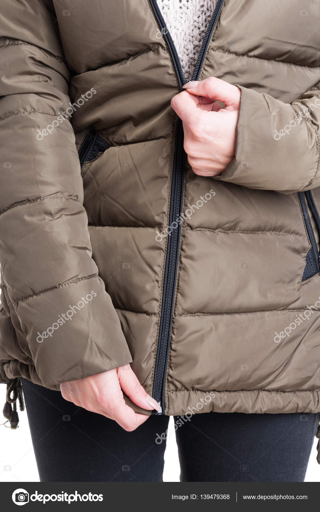 Closeup of lady zipping winter jacket — Stock Photo © catalin205