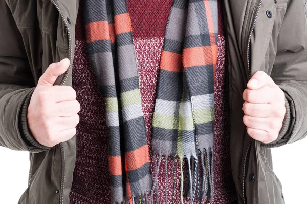 Close-up of man showing comforter sweater and jacket — Stock Photo, Image