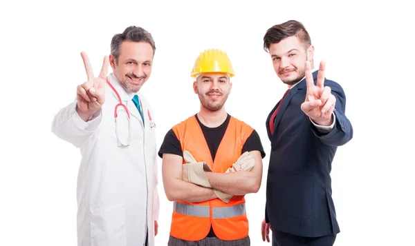 Doctor or medic and businessman showing peace gesture — Stock Photo, Image