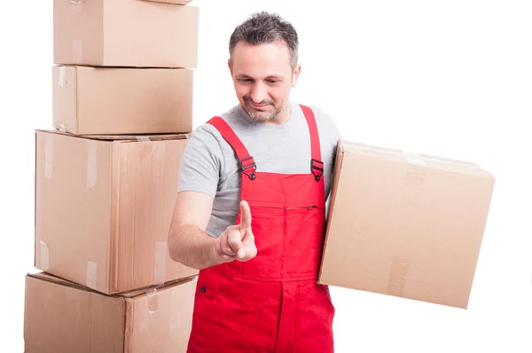 Mover man holding cardboard box using invisible touch screen — Stock Photo, Image