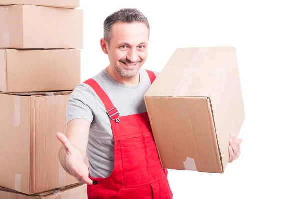 Portrait of smiling mover man offering hand shake — Stock Photo, Image