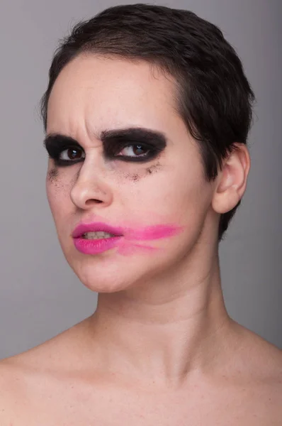 Young woman with dirty makeup — Stock Photo, Image