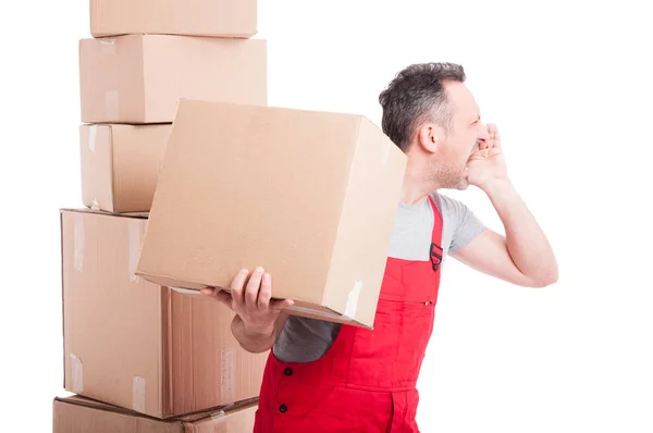 Side view of mover guy holding box and screaming — Stock Photo, Image