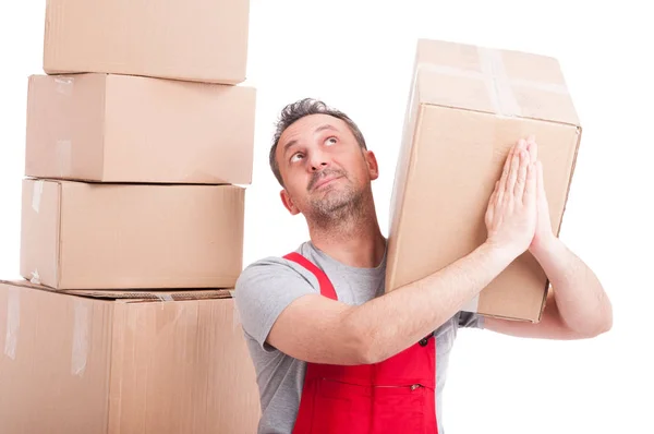 Mover guy holding box and making praying gesture — Stock Photo, Image