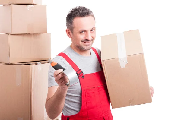 Mover homem segurando caixa cortador e fita adesiva — Fotografia de Stock