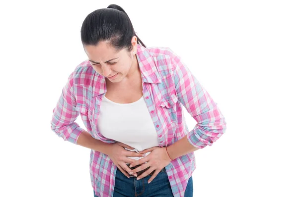 Mujer joven con fuerte dolor de estómago —  Fotos de Stock