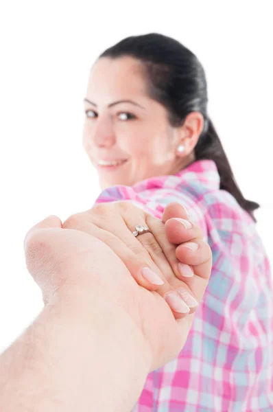 Man holding female hand with engagement ring — Stock Photo, Image