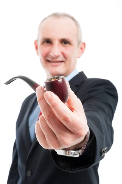 Selective focus of elegant man holding a pipe — Stock Photo, Image