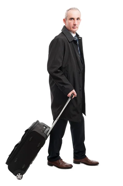 Homem de negócios de meia idade com bagagem de mão — Fotografia de Stock