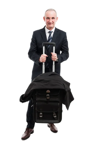 Middle age business man holding up his luggage — Stock Photo, Image