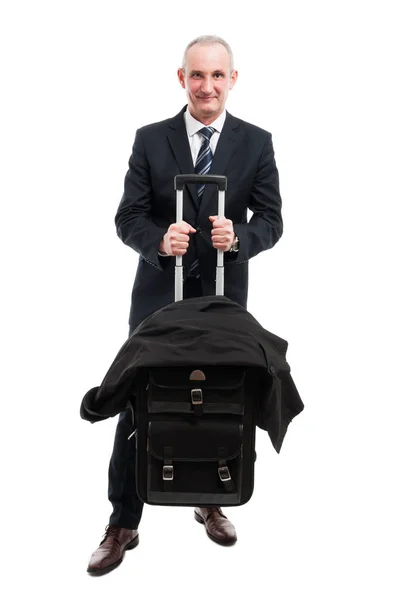 Middle age business man holding up his luggage Stock Image