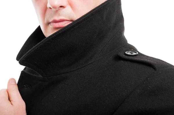 Close-up of elegant man posing with collar up — Stock Photo, Image