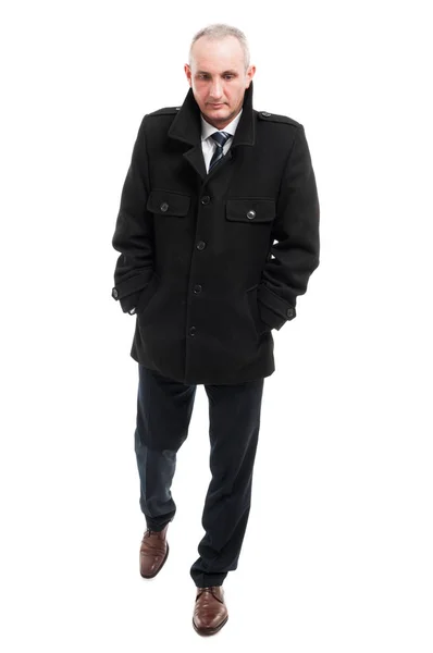 Full body of middle age business man walking wearing overcoat — Stock Photo, Image